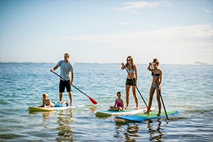 Family on paddleboards
