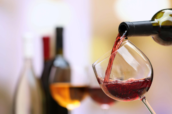 red wine being poured into glass